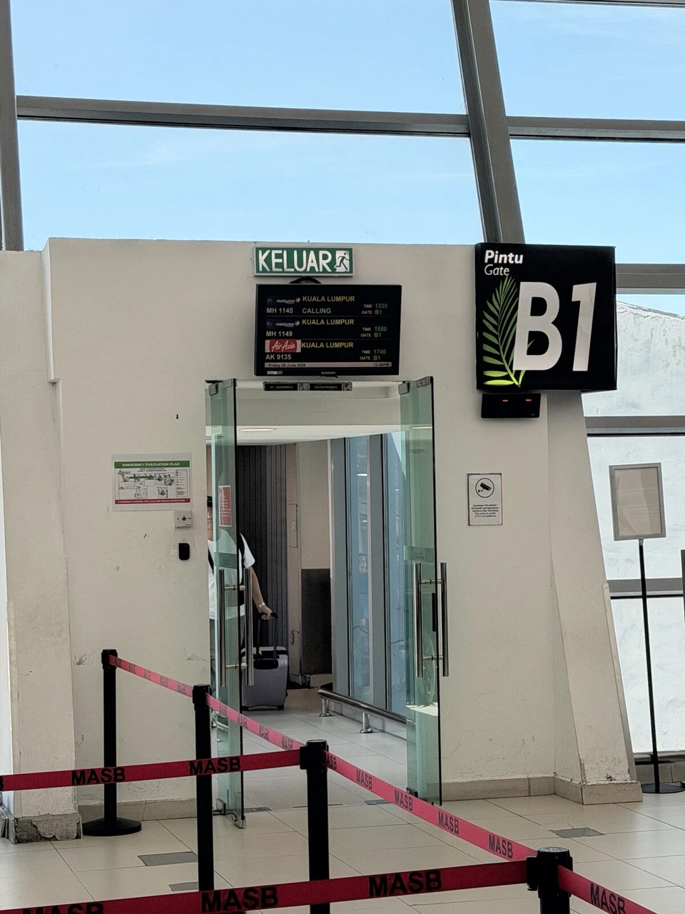 ペナン国際空港のB1ゲート。クアラルンプール行きの案内表示