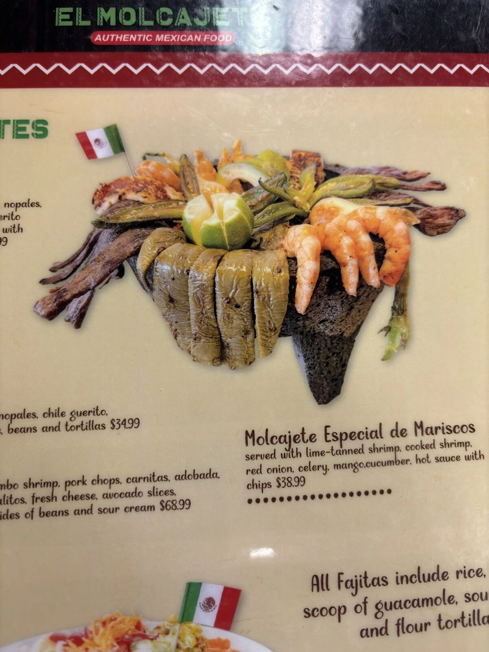 メキシコ料理店El Molcajeteのメニュー。石の器に盛った海鮮のモルカヘテの写真